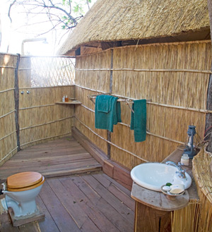 Zambia bush bathrooms: open-air ones like this at Nsolo Camp are suited to Zambia's warm weather.