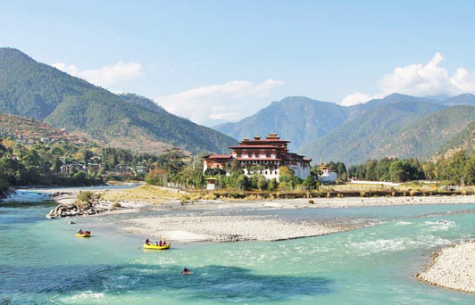 Authentic luxury travel is rafting in Bhutan.