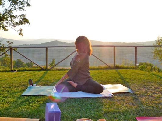 Anne Marie teaches yoga poses in Radicondoli and her friends in the community teach cooking - and more!