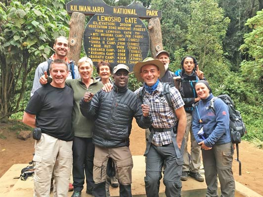 The team is ready to begin the journey to the top of Kilimanjaro. Everyone still has clean clothes and smells great!