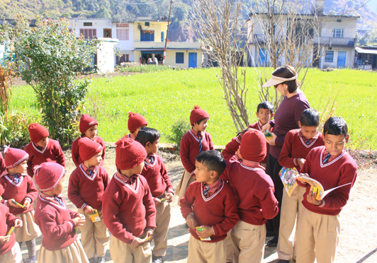 Our India travel planner made arrangements for me to deliver school supplies in a village along the Shakti Walk.