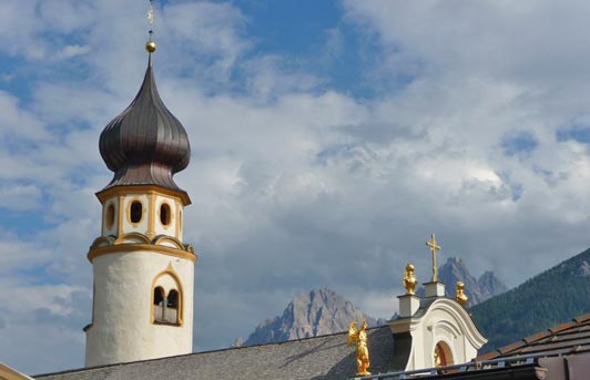 San Candido is one of the picturesque spots passed by those walking in the Dolomites.