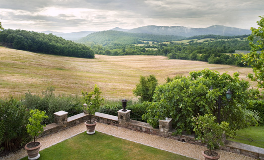 The panoramic view from this balcony is one of the reasons Borgo Santo Pietro just might be the best romantic hotel in Tuscany.